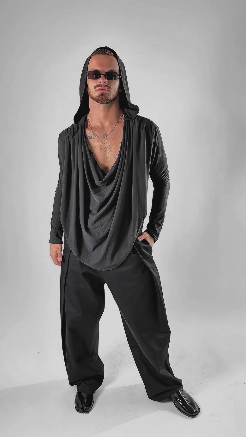 Black hooded blouse with a water neckline